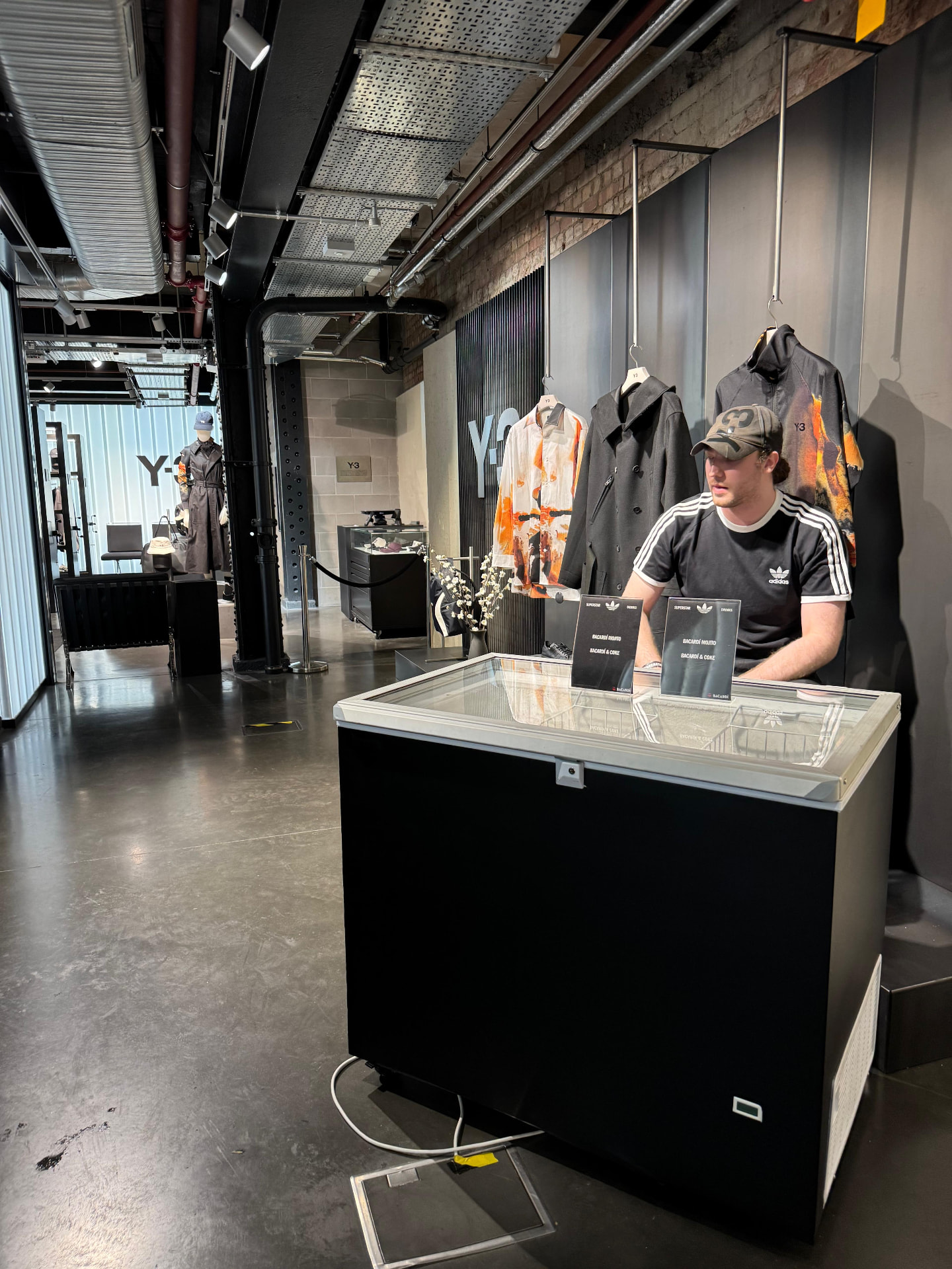 Double door drinks cooler and merchandise display at an in-store event