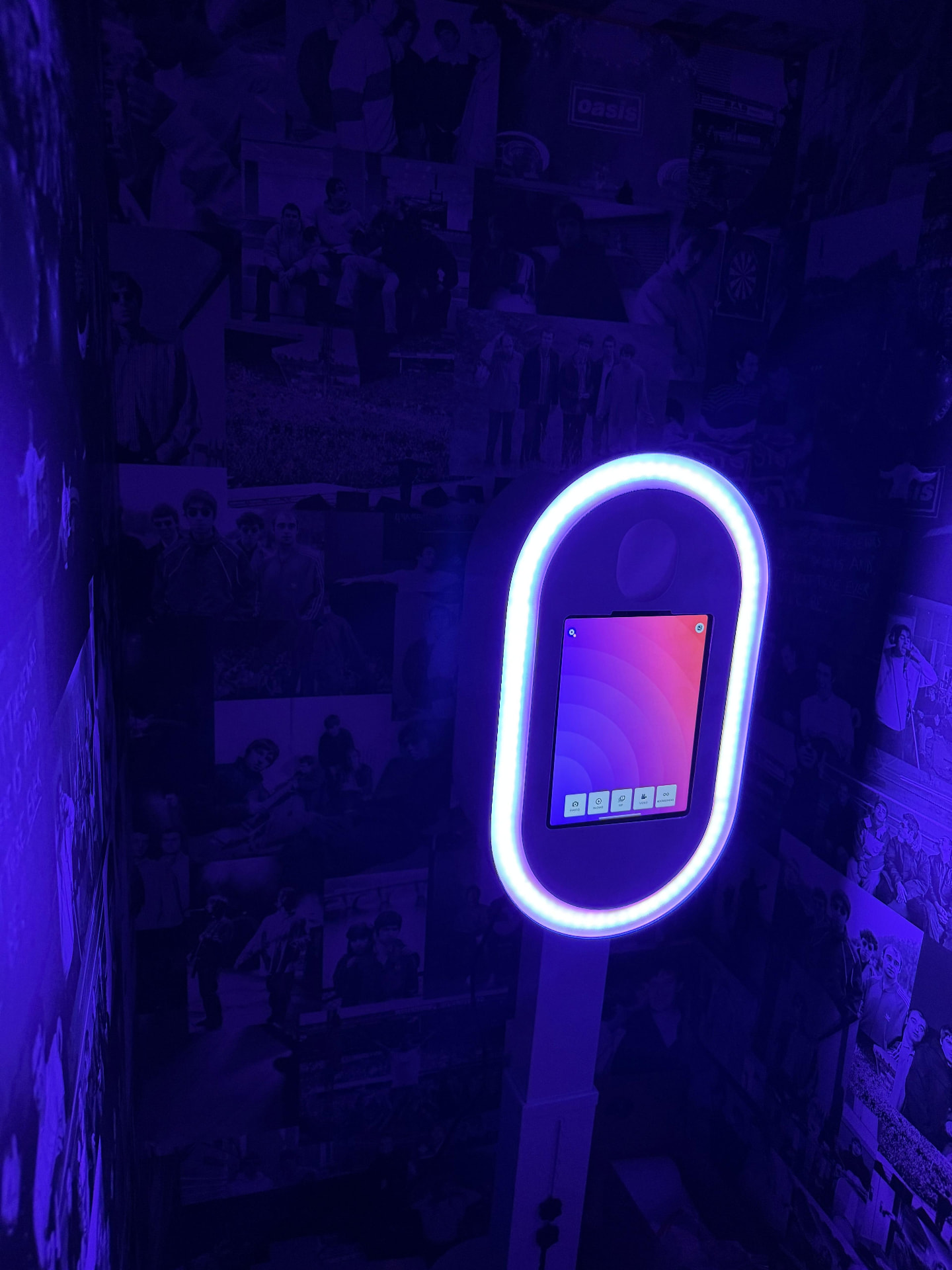 LED ring photo booth screen inside a branded booth cabin